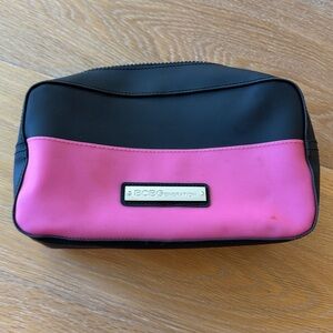 BCBGeneration plastic zippered cosmetic case pink black